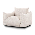 Sand colored coarse fabric armchair