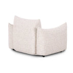 Sand colored coarse fabric armchair