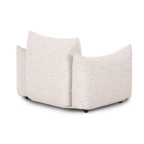 Sand colored coarse fabric armchair
