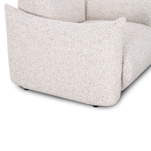 Sand colored coarse fabric armchair
