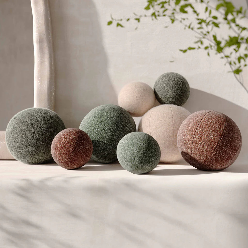 Textured woven spherical throw pillow (9-14 inches)